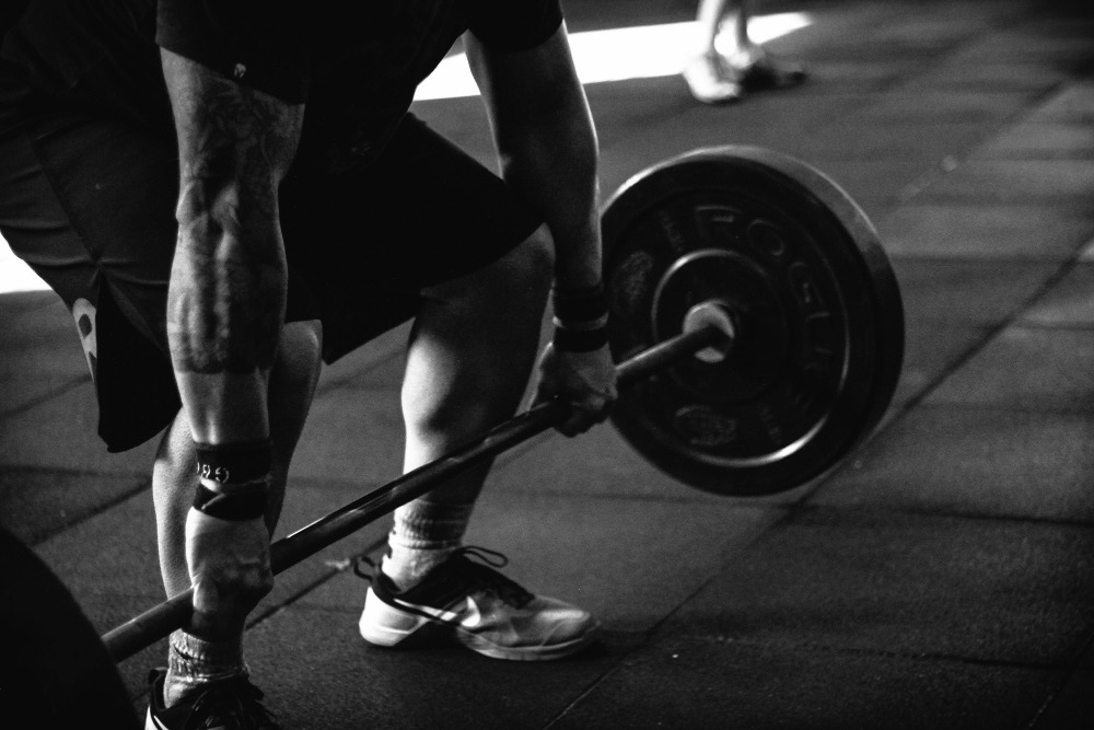 focusing on deadlift technique with physiotherapy to improve back strength
